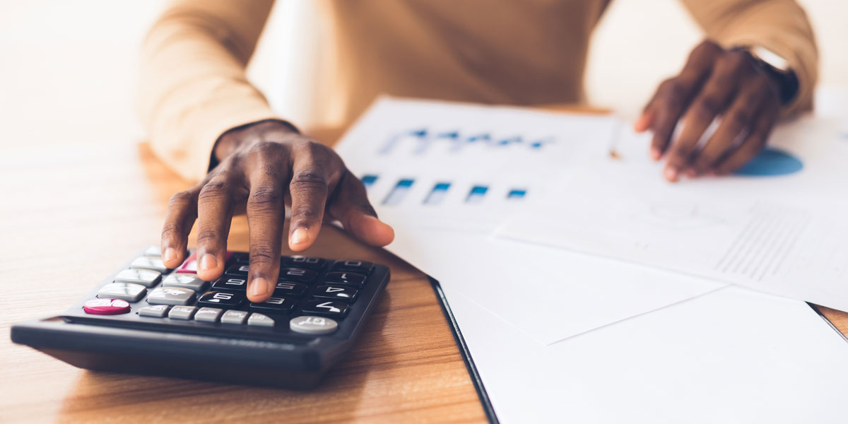 woman using calculator